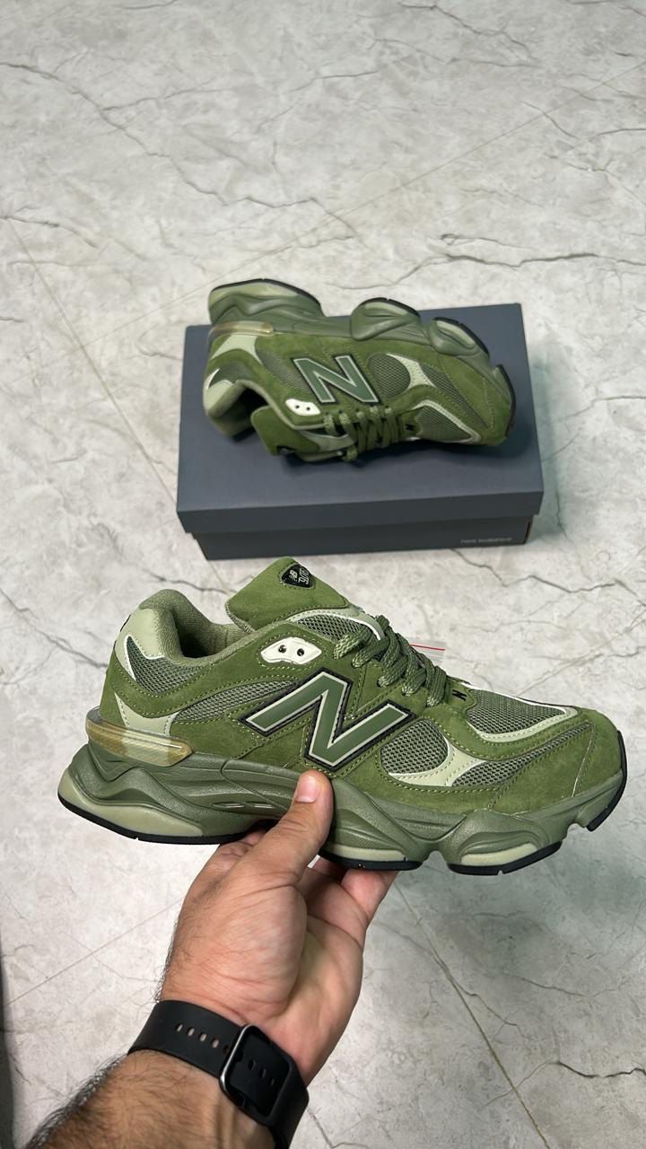 c1 New Balance 9060 in a green/olive colorway - Image 1
